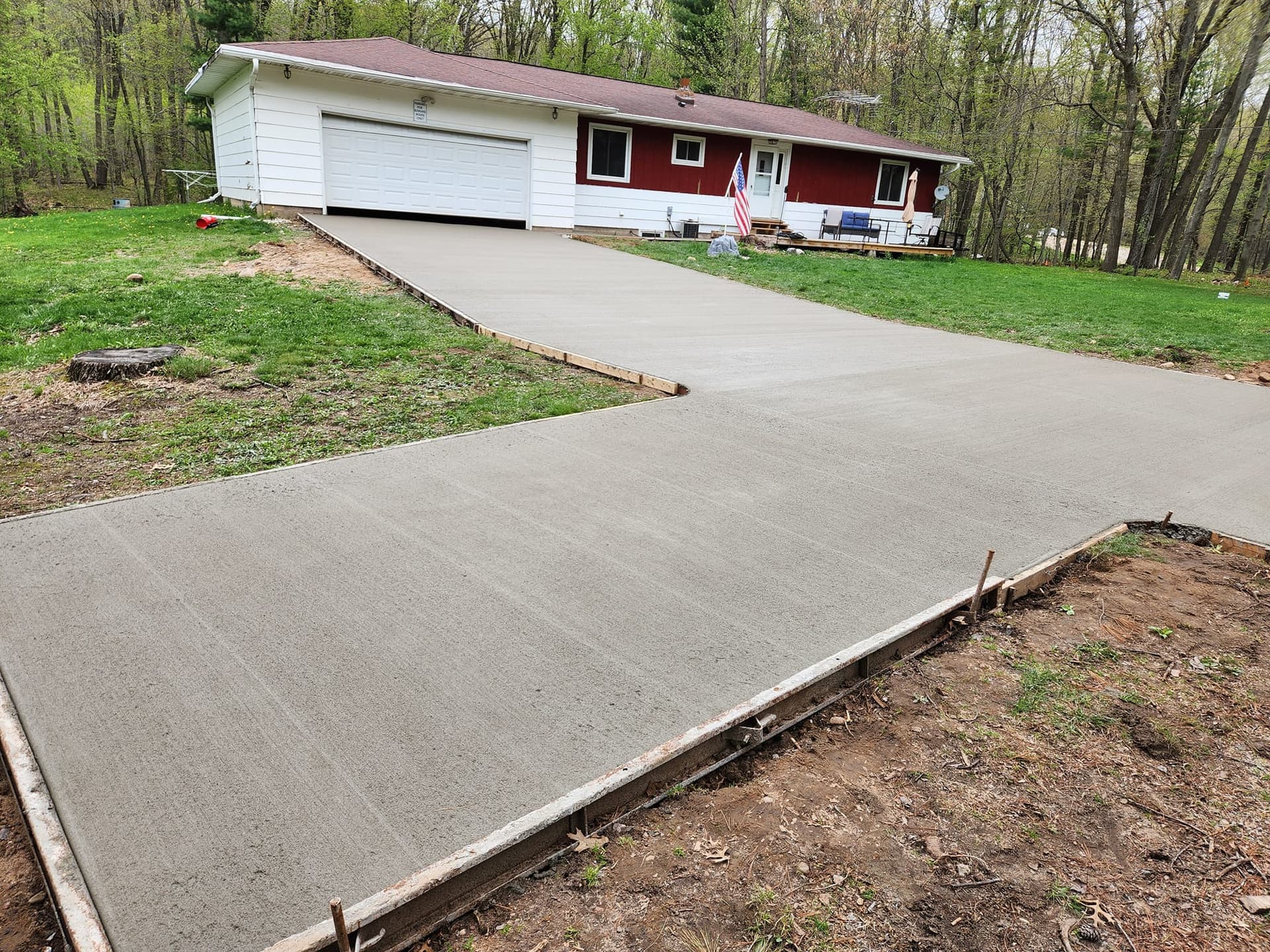 Concrete driveway installation by Chally Construction